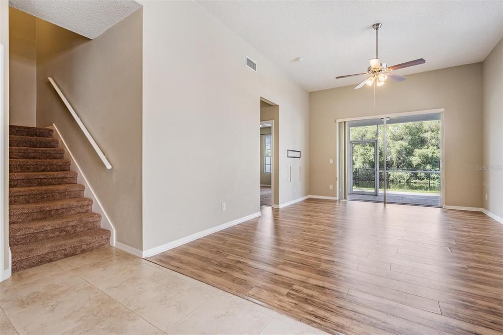 Living room w/sliders to the patio & water view