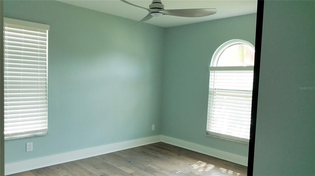 2nd bedroom with bath doors on closet