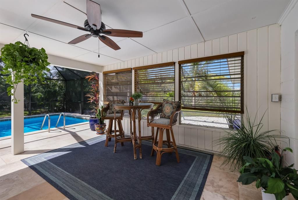 There's even ample space to enjoy some alfresco dining on this expansive lanai.