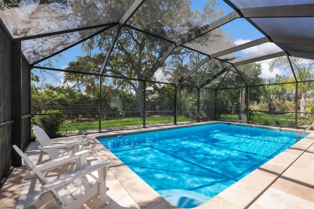 Screened in, enjoy an easier maintained pool with more protection from the natural elements.