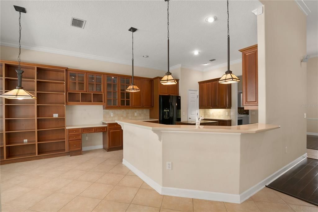 A beautiful kitchen opens onto the family living area.