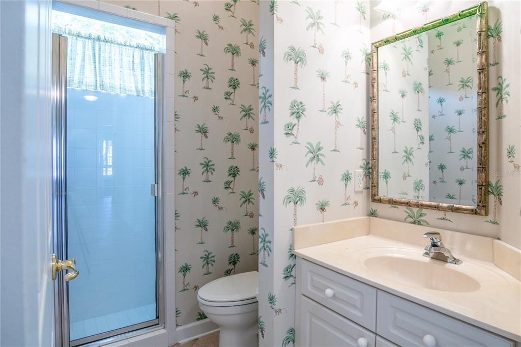 the 3rd Bathroom is adjacent to the 3rd bedroom and can be accessed from the pool lanai.