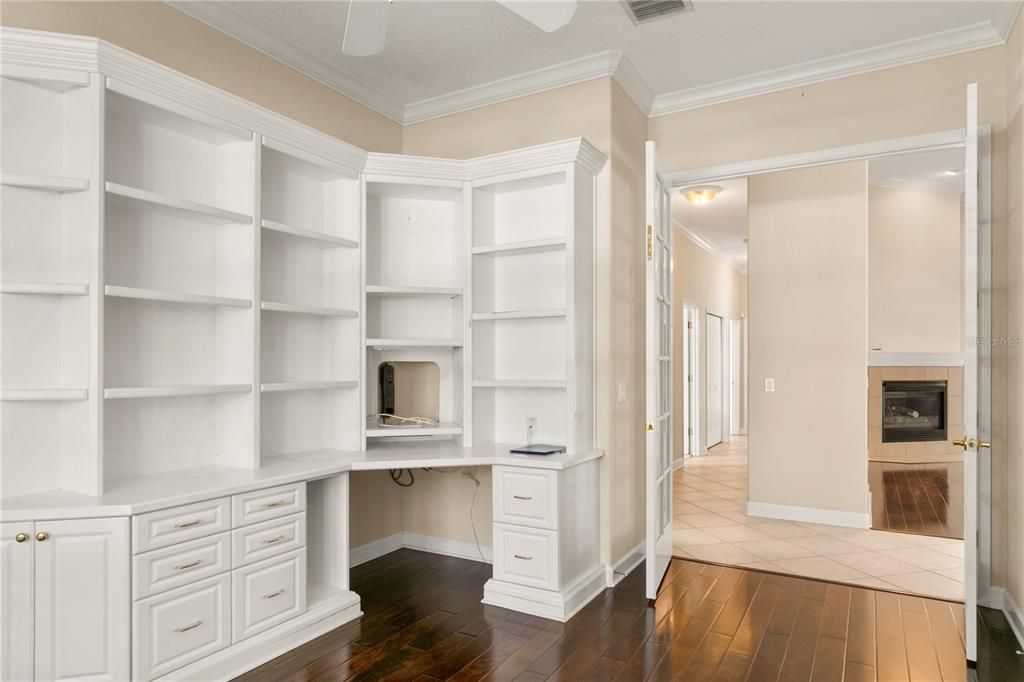 Office with built-in cabinets.