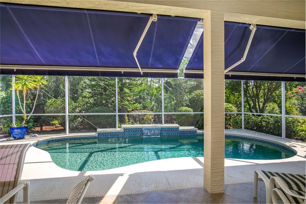 A retractable awning with remote provides shade when desired.