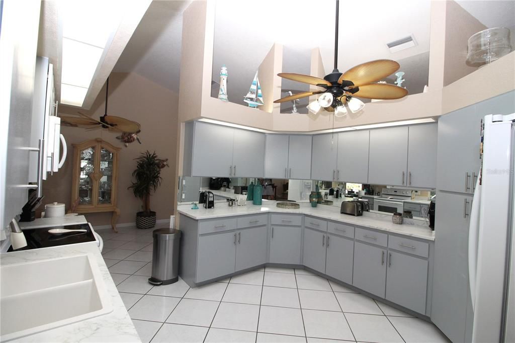 Kitchen with built-in plant shelves...