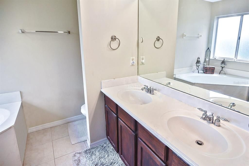 Space to get ready with 2 sinks to utilize in the Primary Bathroom