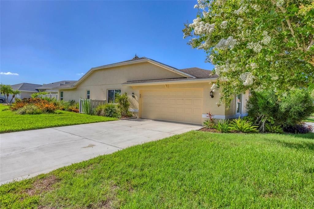 Side load garage with circular driveway in front