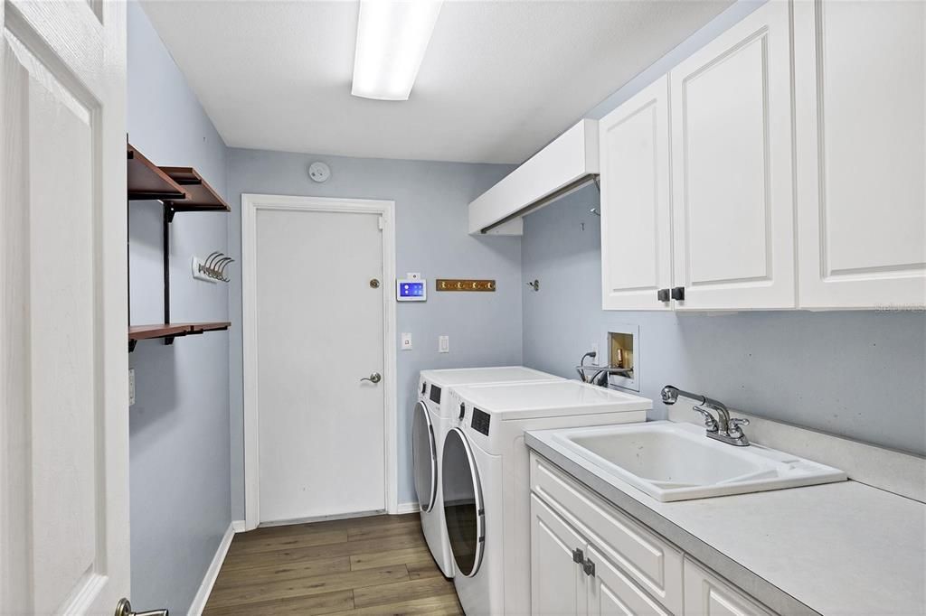 Inside laundry room and entrance to the garage