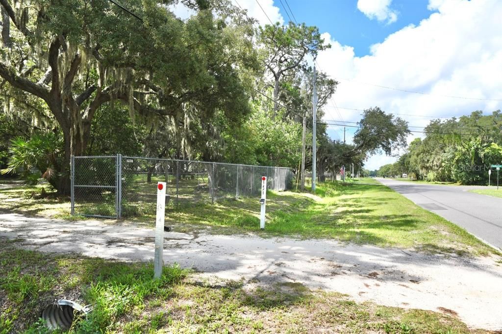 Entrance of Property with Chain Link Fence