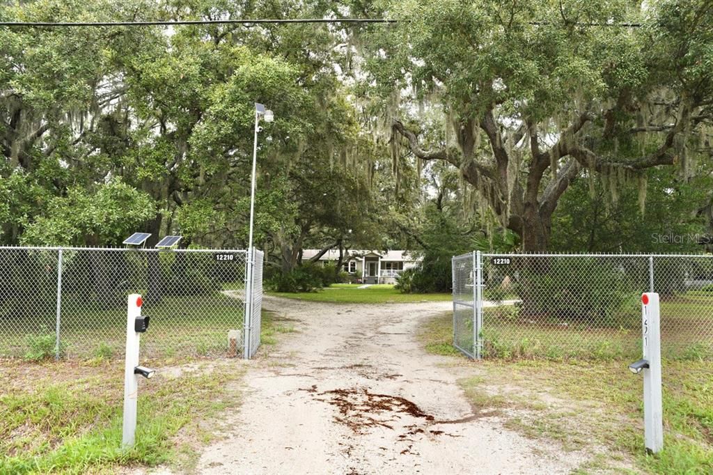 Entrance of Property with Chain Link Fence