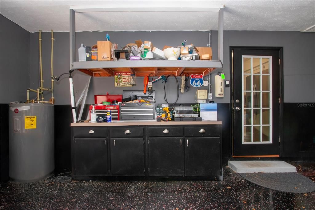 Garage door leading into the kitchen. Perfect when coming home with groceries.