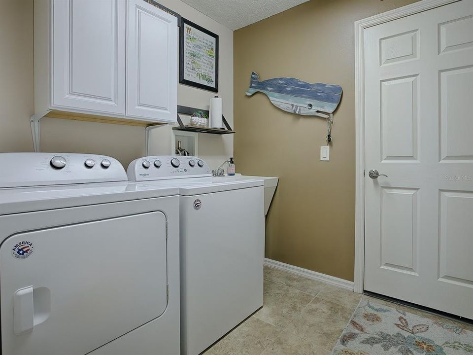 INTERIOR LAUNDRY ROOM WITH EXTRA CABINETS