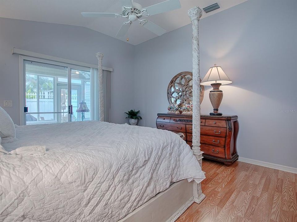 SLIDER DOORS TO LANAI FROM PRIMARY BEDROOM