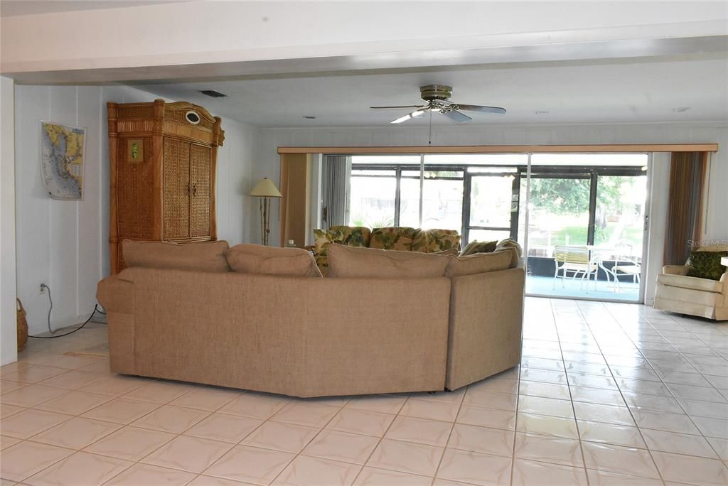 Living room looking toward sliding doors to lanai