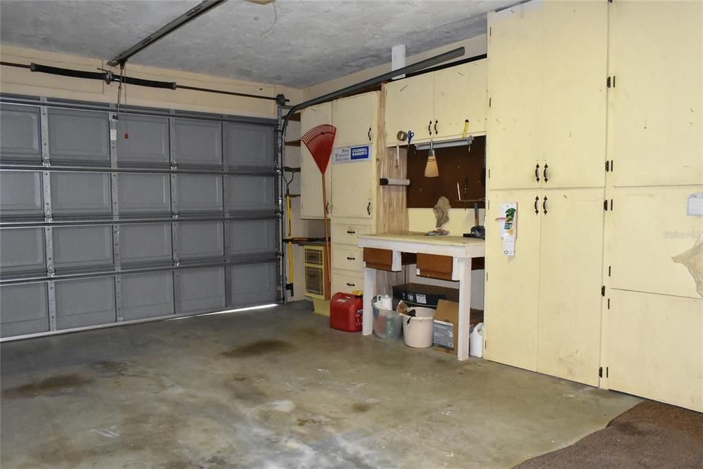 garage with workshop and storage
