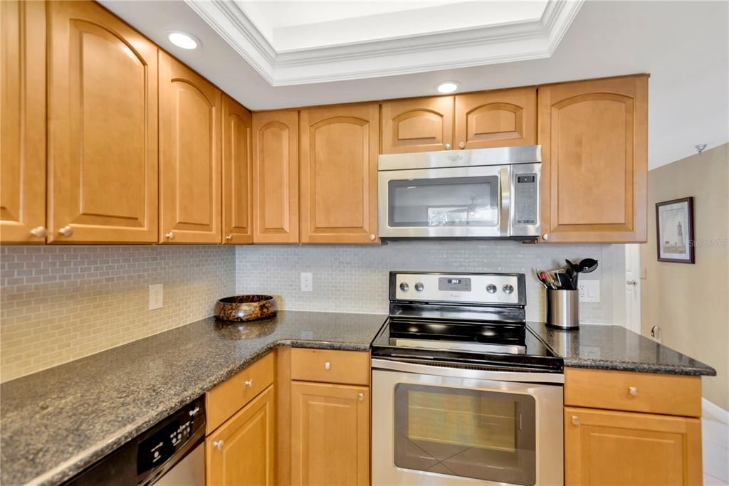 Let me point out this beautiful tray ceiling which adds added interest to this already stunning kitchen.