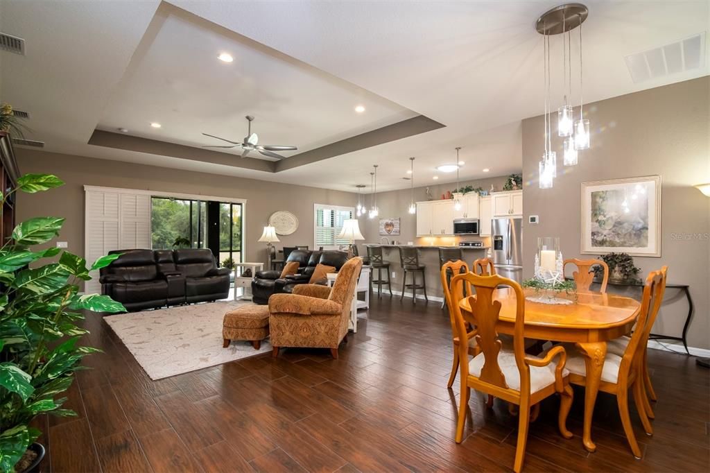 Open floor plan of dining, living and kitchen