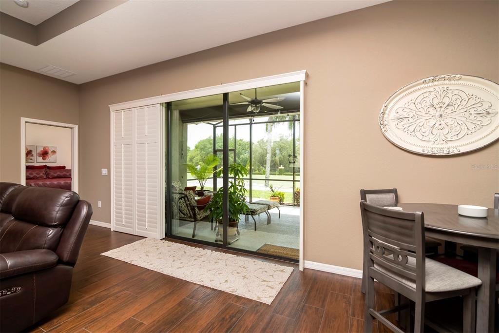 Triple sliding doors with plantation sliding shutters for privacy