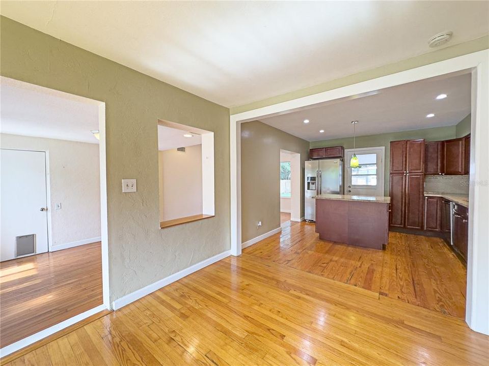 Living room with view of kitchen