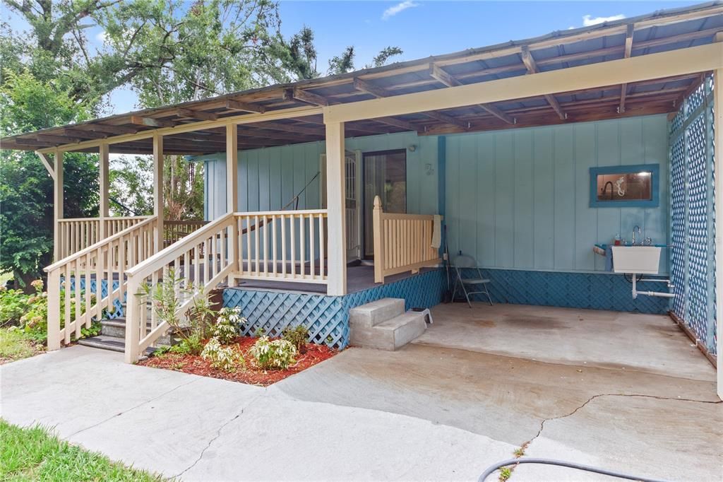 Back porch with view of the carport.