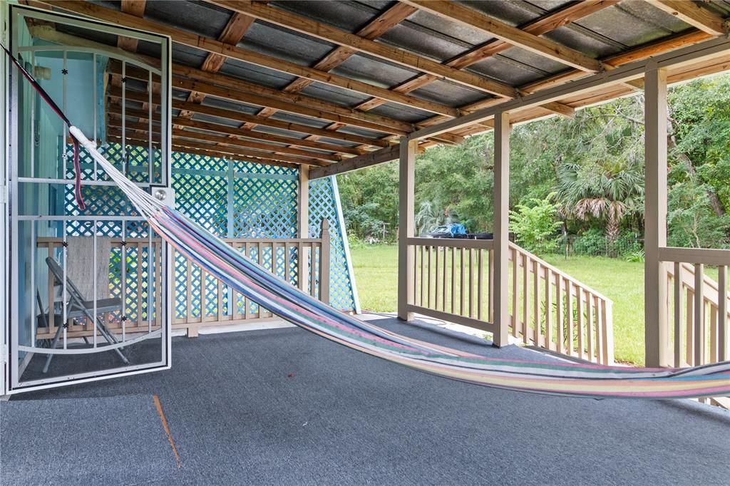 The hammock on the back porch.