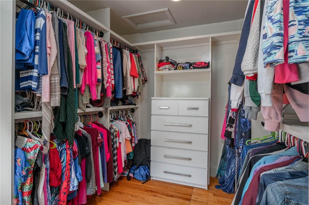 Primary closet with built in dresser