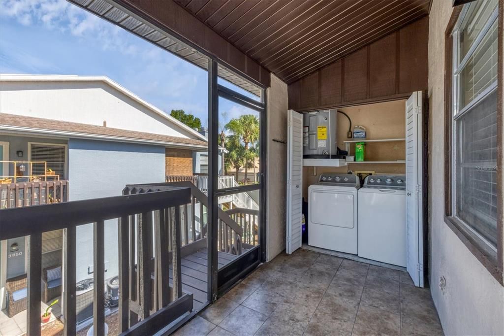 Front screened entry, laundry, hot water heater at 3862 59th Ave. W, Bradenton FL 34210