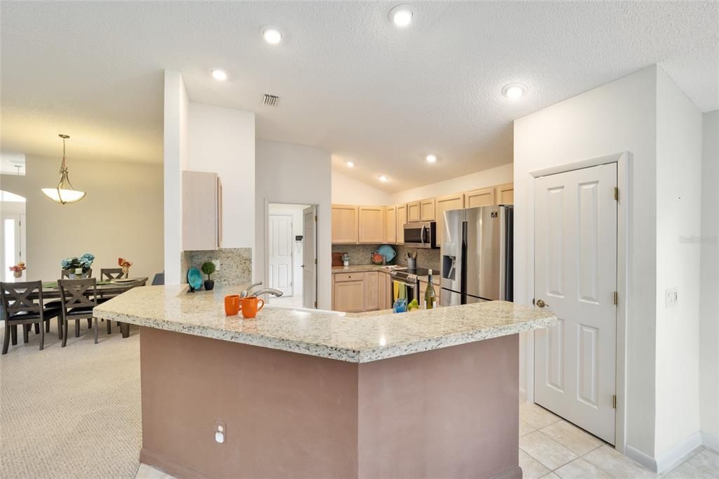 the kitchen has newer stainless appliances