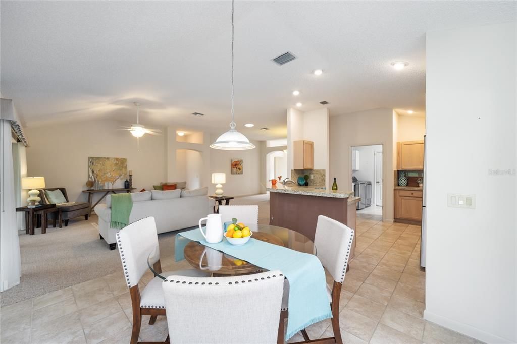 Looking into the kitchen and then the laundry room beyond that