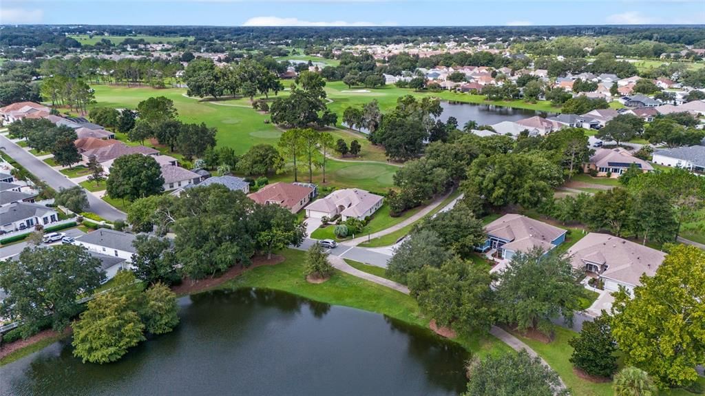 There is a pond out the front door and a double fairway behind the home.