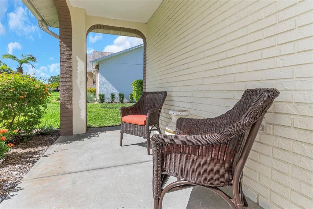 Covered seating area front of the home