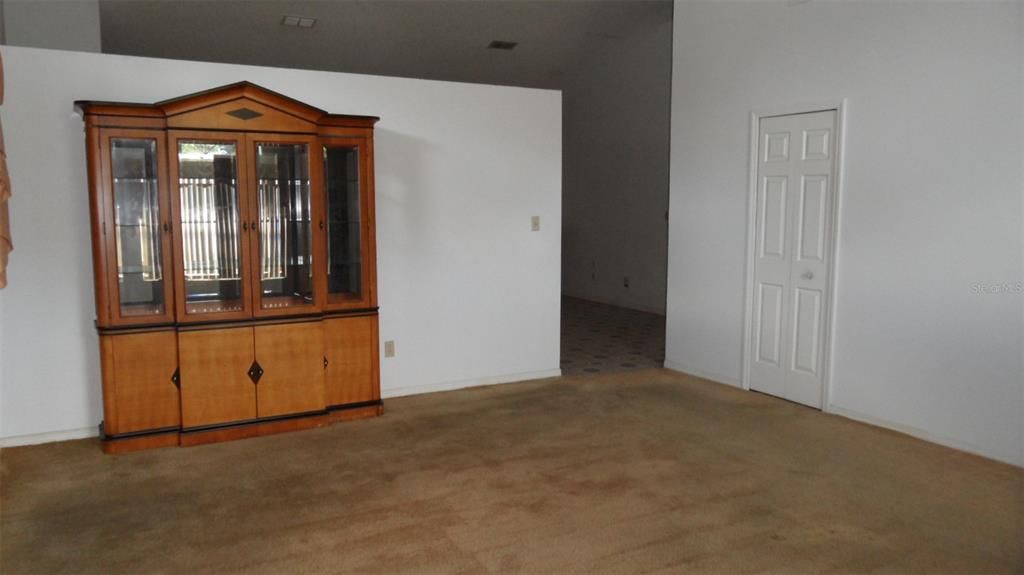 Dining room/living room combo with coat closet