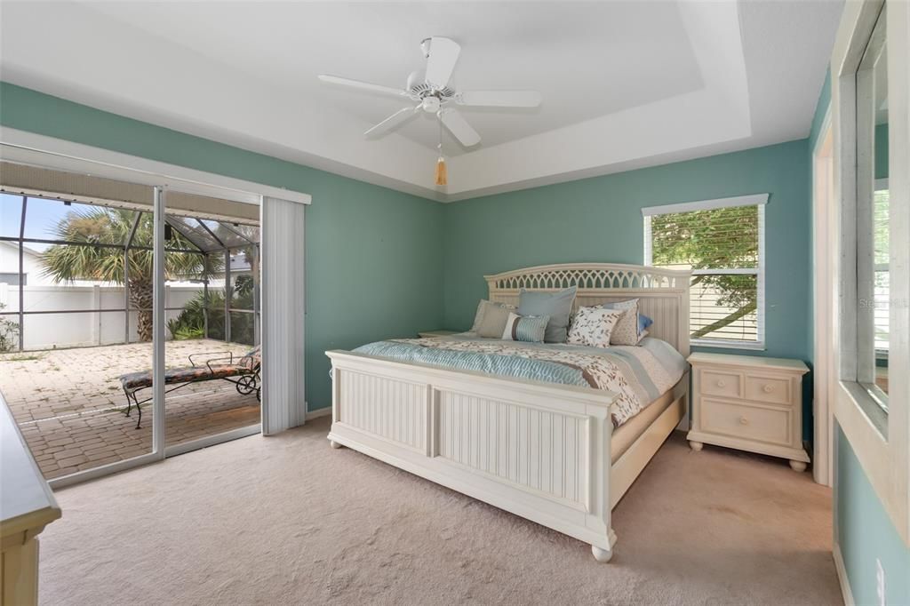 Master Bedroom w/Sliders to Lanai & Pool