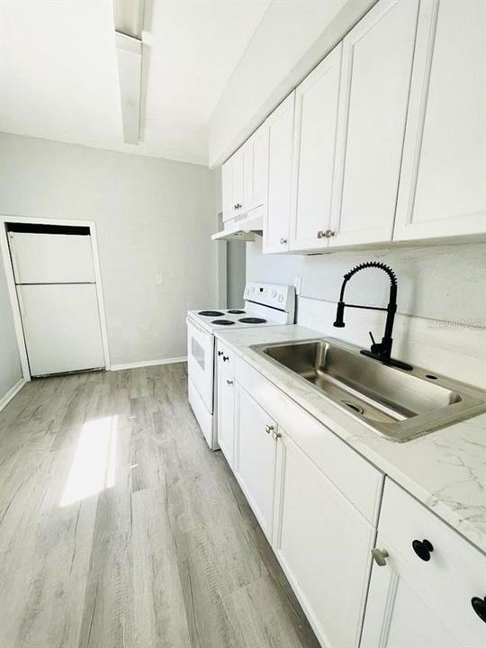 Upstairs unit kitchen