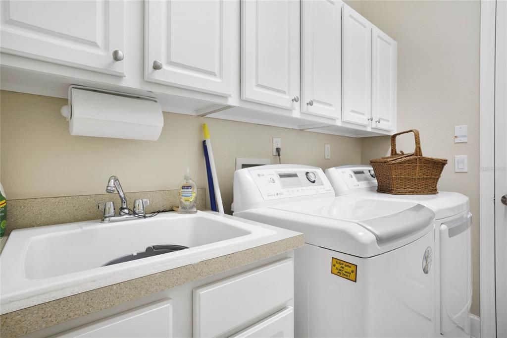 Laundry with sink and extra storage