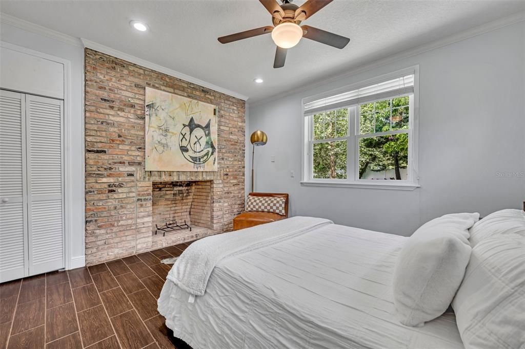 Downstairs Bedroom 3 with a Charming Fireplace