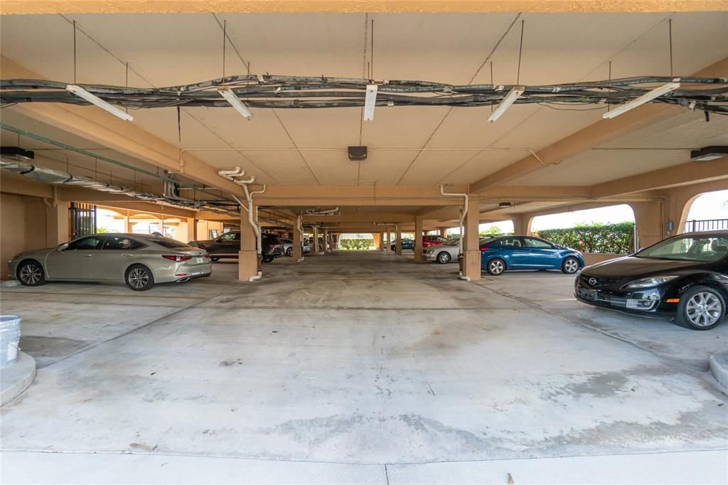 2 covered parking spaces and a storage unit on the 1st level