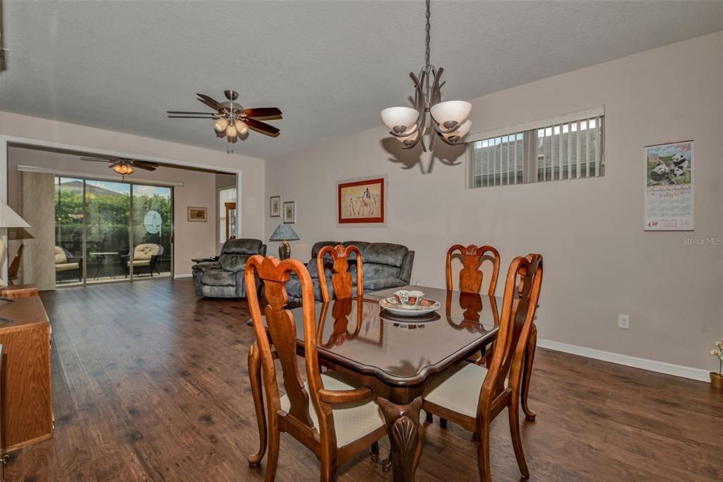 View of Dining Area  thru to Living Room and Enclosed Lanai Area