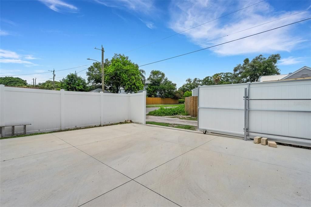 The rolling gate provides excllent access to the back yard