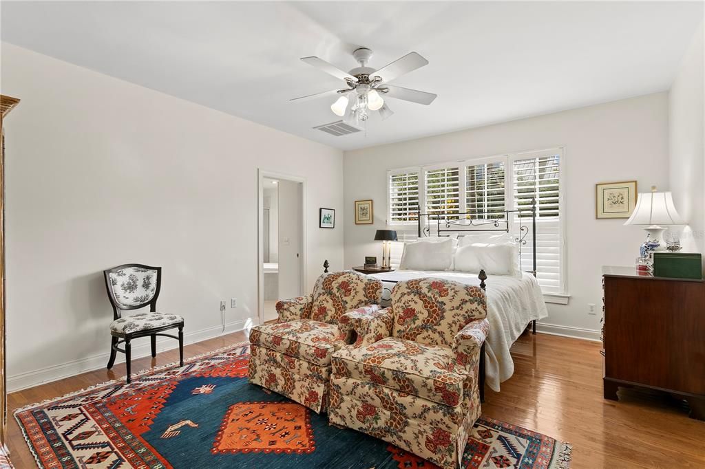 The spacious first floor primary bedroom