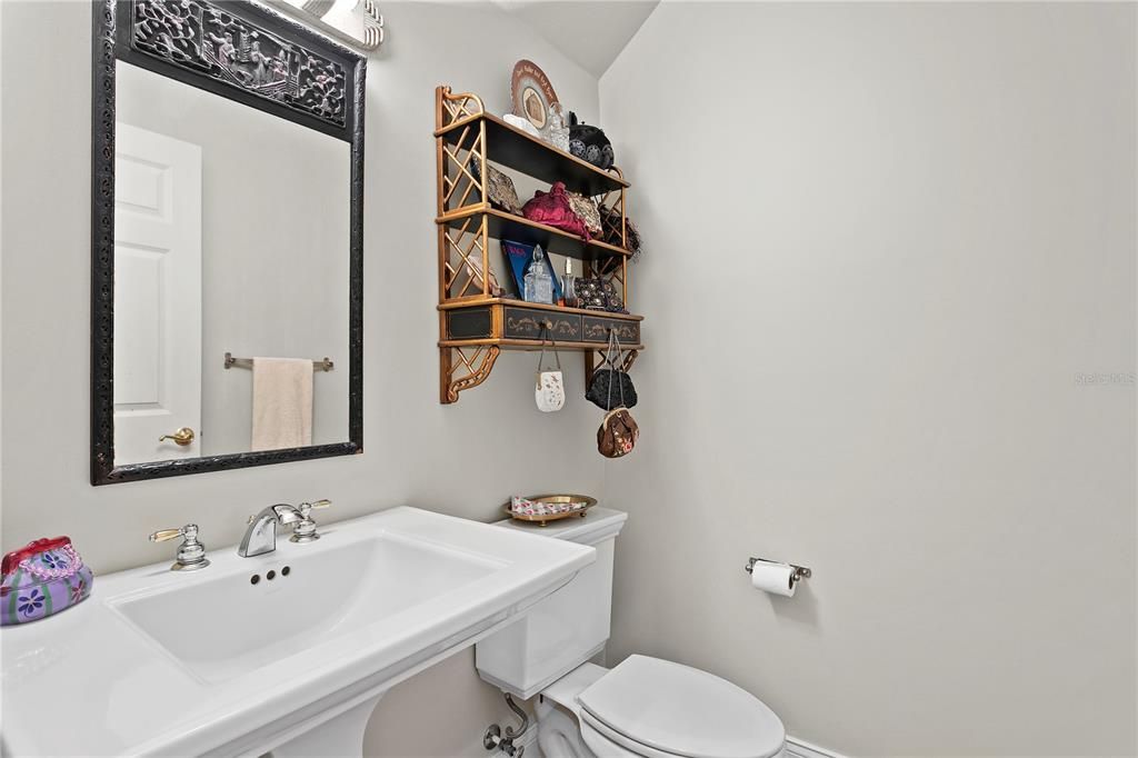 Half bathroom located on the first floor of the home for guests