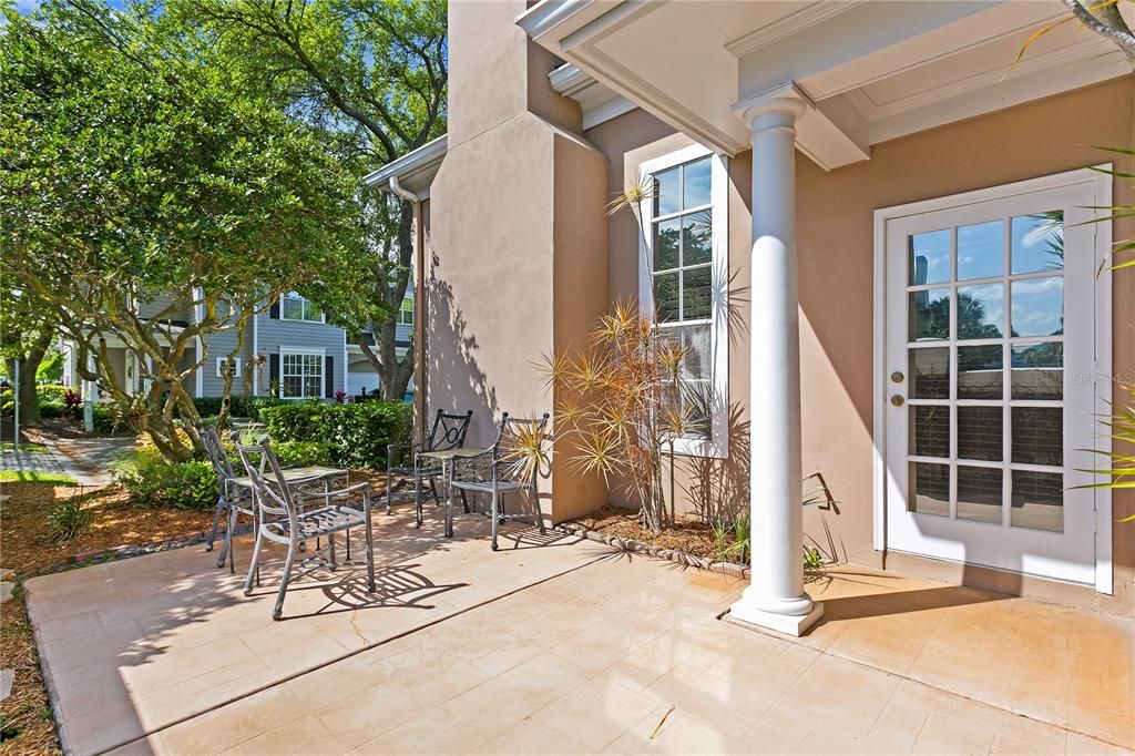 Delightful outdoor patio and garden space off of the kitchen