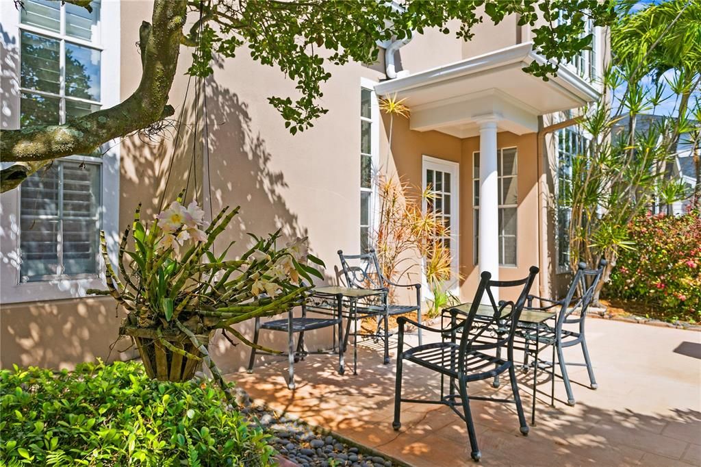 Delightful outdoor patio and garden space off of the kitchen