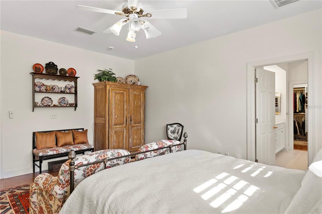 The spacious first floor primary bedroom