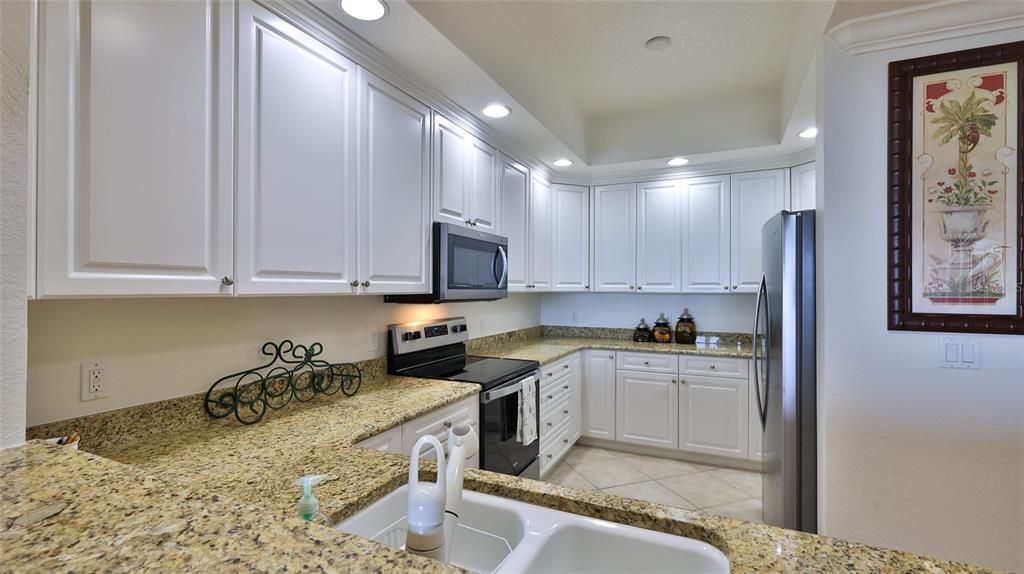 Kitchen with almost new stainless appliances and Granite Counter Tops