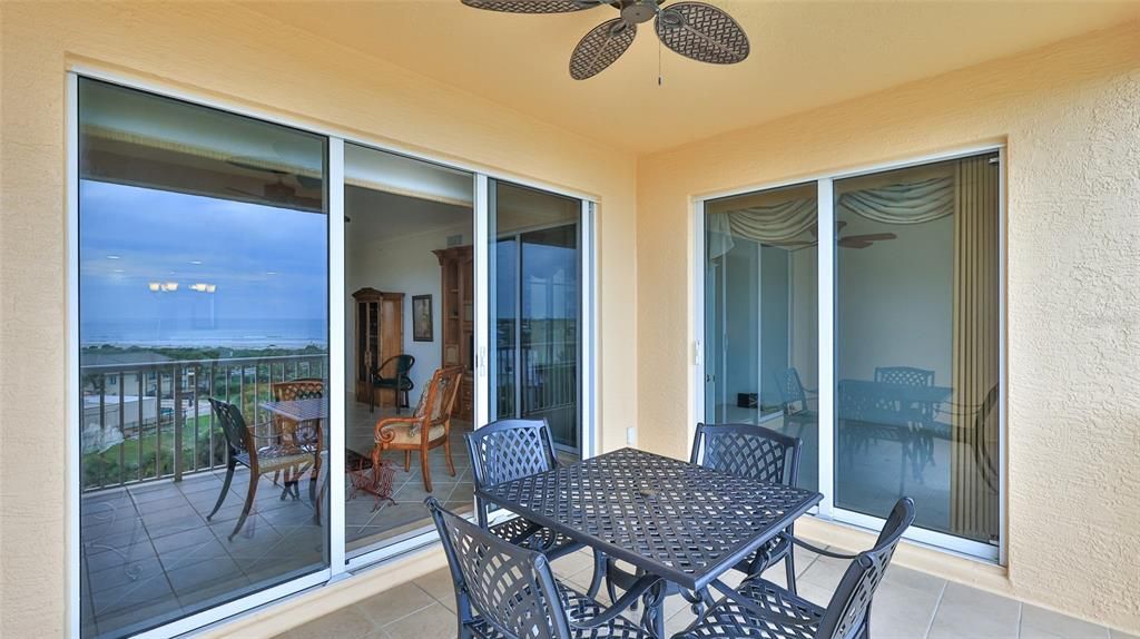 covered balcony with almost new ceiling fan