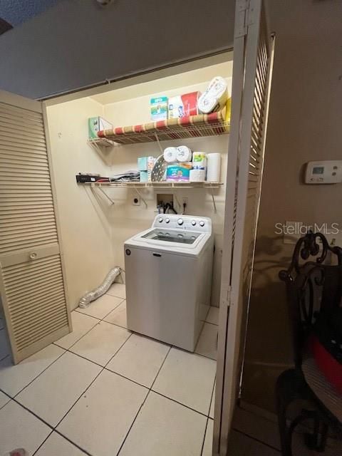 Laundry area. Washer does not convey