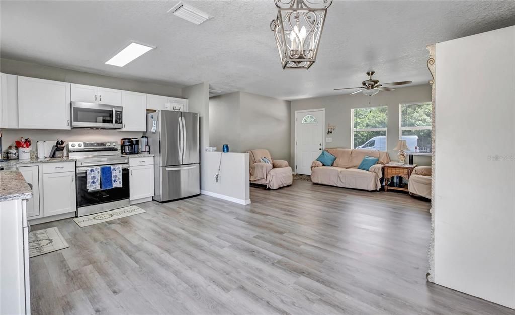 Stainless steel appliances and granite counter