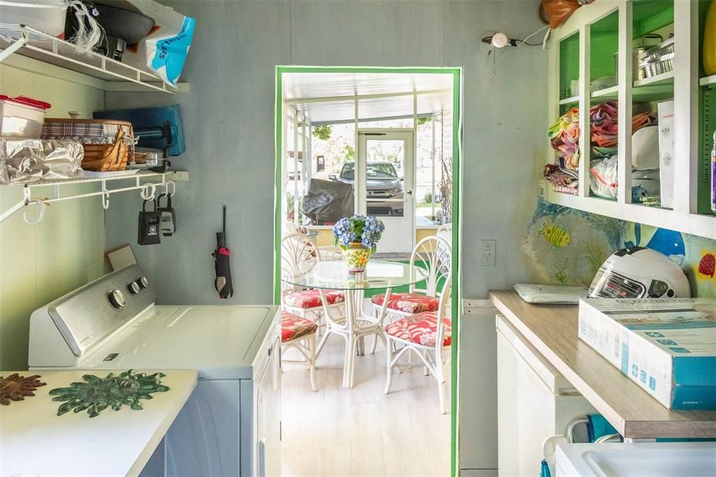 from carport to washer/dryer/sink tub area