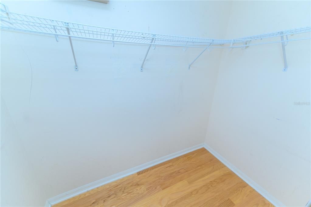 Primary walk in closet 1/2